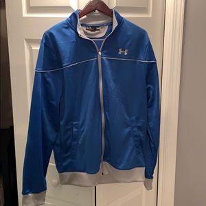 Under Armour full zip blue and grey track jacket.